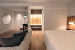Кровать или кровати в номере Estanplaza Nações Unidas +38 фотографий