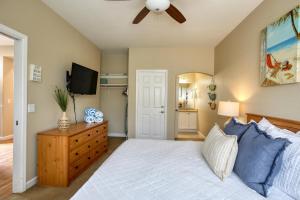 a bedroom with a bed and a ceiling fan at Pacific Plaza #509 - Lighthouse Lodge - 1BdrmUp-K-QSofa in Oceano +22 photos