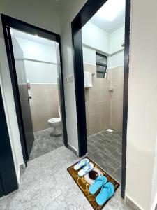 Koupelna v ubytování Queens Stay Apartment