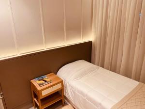 Postel nebo postele na pokoji v ubytování Apto de 2 quartos e Ar Condicionado perto do Praia Clube