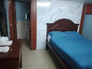 Ένα ή περισσότερα κρεβάτια σε δωμάτιο στο Hotel tower one +4 φωτογραφίες