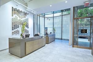 a lobby with a reception desk in a building at Club Wyndham Midtown 45 in New York