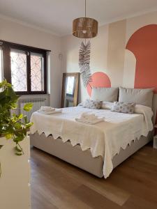 Giường trong phòng chung tại dormiacasamia