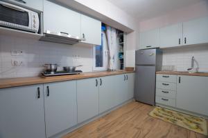 Kuchyň nebo kuchyňský kout v ubytování Home Norma