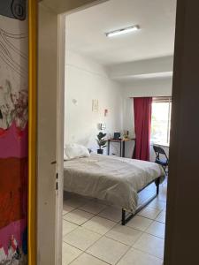 Postel nebo postele na pokoji v ubytování Chez Dana