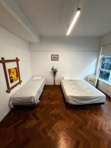 Ένα ή περισσότερα κρεβάτια σε δωμάτιο στο HouseCheconquista