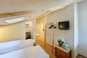 Voodi või voodid majutusasutuse Hotel-Restaurant zum Gade toas