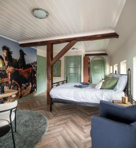 Ένα ή περισσότερα κρεβάτια σε δωμάτιο στο Bed and Breakfast de Hoge Enk