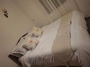 Ένα ή περισσότερα κρεβάτια σε δωμάτιο στο Ben's Apartment +7 φωτογραφίες