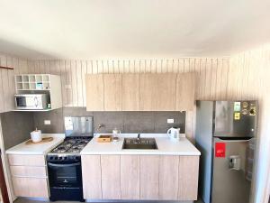 Kuchyň nebo kuchyňský kout v ubytování Casa Puntalodge + 23 fotografií