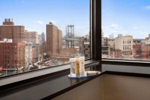 a view of a city skyline from a window at Hotel Richland LES in New York