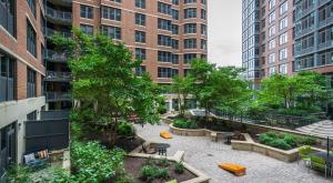 a courtyard in the middle of a city with buildings at The Stay 2 - Navy Yard Washington DC in Washington