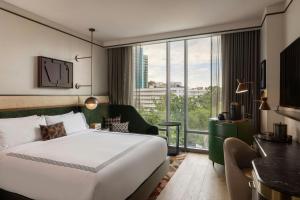 Ένα ή περισσότερα κρεβάτια σε δωμάτιο στο The Tess, Autograph Collection