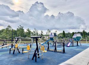 a group of playground equipment in a park at C180 Trader Park 3Room Balcony Free Parking #C13 in Cheras