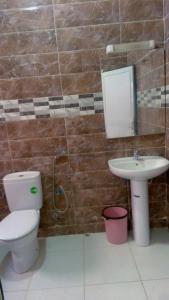 Koupelna v ubytování Appartements hôteliers Hayat