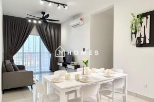a white dining room with a white table and chairs at C180 Trader Park 3Room Balcony Free Carpark #10 in Cheras