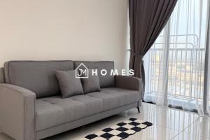 a living room with a couch and a window at C180 Trader Park 3Room Balcony Free Carpark #10 in Cheras