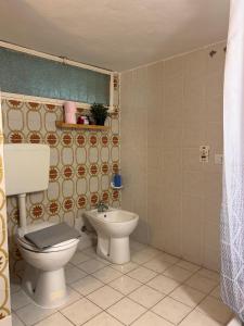 Ванная комната в Casa vacanze Marinella +27 фотографий