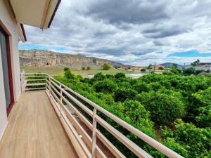 a balcony with a view of the mountains at Cyclopean View Suites in Nafplio