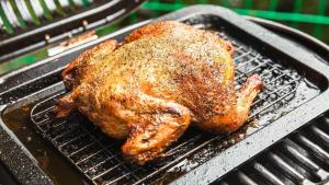 a chicken is being grilled on a grill at SPRINGS VILLAGE Ashigara Tanzawa Onsen Resort & Gl - Vacation STAY 51637v in Hata
