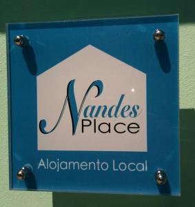 a sign for a nantes place at anatlanticololocal at Nandes Place in Praia da Vitória