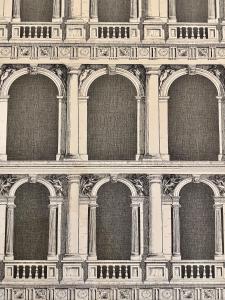 a building with arches on the side of it at The first floor - Exclusive Rooms in Pompei
