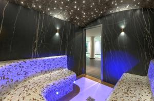 เตียงในห้องที่ Chalet Bellecote Courchevel +15 ภาพ