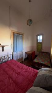 Ένα ή περισσότερα κρεβάτια σε δωμάτιο στο La Casa Atahualpa +25 φωτογραφίες