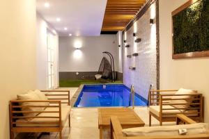 Kolam renang di atau dekat dengan Pool, Jacuzzi and Grill for 10 people