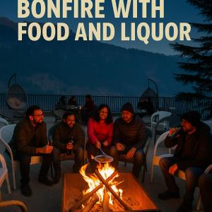 a group of people sitting around a fire with food and liquor at hotel blue by ocean stay in Manāli +11 photos