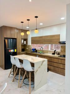 Η κουζίνα ή μικρή κουζίνα στο Apartamento de lujo a pocos minutos del centro