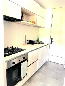 Kuchyň nebo kuchyňský kout v ubytování Apto en santa marta a 10 min del mar, excelente descanso