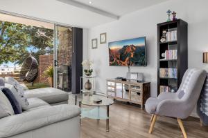O zonă de relaxare la Edge One - Dog Friendly Jindabyne Holiday Apartment