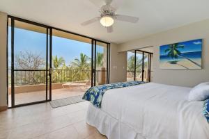 Postel nebo postele na pokoji v ubytování Paki Maui 424 · PM424 BeachFront 2BD w Ocean View + 163 fotografií