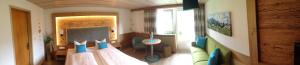 A seating area at Sonnleiten - Guggerhof - Villa Sonnenwies