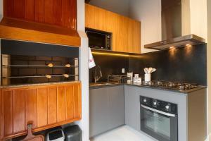 Kuchyň nebo kuchyňský kout v ubytování Duplex Cobertura - Coração de Gramado