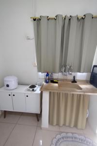 O bucătărie sau chicinetă la Edícula em São Pedro