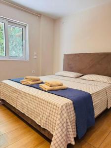 アテネにあるsea soul houseの寝室に並んで置かれた2つのベッド