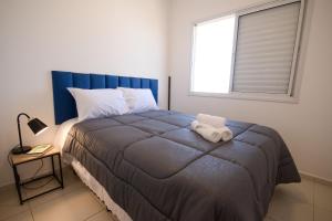 En eller flere senge i et værelse på Acqua Village + 33 billeder