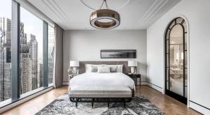 Postel nebo postele na pokoji v ubytování The, Langham Jakarta