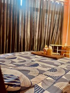 Katil atau katil-katil dalam bilik di Rhythm of life guesthouse 56