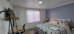 Ένα ή περισσότερα κρεβάτια σε δωμάτιο στο Hostal Milaris