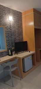 an office with a desk with a computer and a chair at AT home hotel in Hua Hin +17 photos