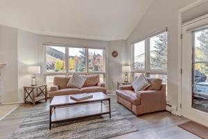 a living room with two couches and a coffee table at Legends 11 townhouse in Wheeler Junction +46 photos