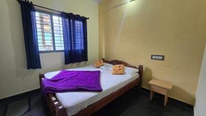 Ένα ή περισσότερα κρεβάτια σε δωμάτιο στο Hk Guest house