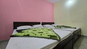 Ένα ή περισσότερα κρεβάτια σε δωμάτιο στο Hk Guest house +20 φωτογραφίες