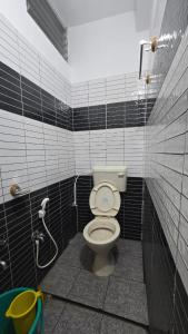 Ένα μπάνιο στο Hk Guest house