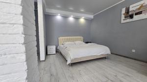 Ένα ή περισσότερα κρεβάτια σε δωμάτιο στο Apartaments on vulytsia Heroiv Ato 32 (97th Kvartal) +7 φωτογραφίες