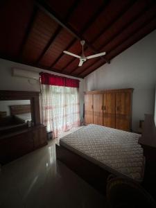 Postel nebo postele na pokoji v ubytování GreenFields Ventures