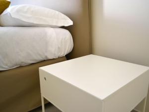 Postel nebo postele na pokoji v ubytování Soggiorni Canario